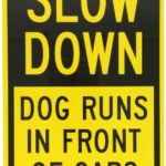 SmartSign Aluminum Sign, Legend”Slow Down – Dog Runs in Front of Cars”, 18″ high x 12″ wide, Black on Yellow