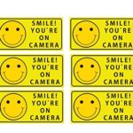 Sutter Signs Smile You’re On Camera Security Stickers Indoor & Outdoor 4-inch by 2-inch (Pack of 6)