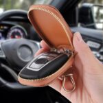 TIESOME Genuine Leather Car Key Case Holder, Universal Auto Key Fob Cover Case Anti Scratch Car Key Protectors Waterproof Vehicle Keyring Zipper Bag with Keychain & Carabiner Car Accessories (Brown)